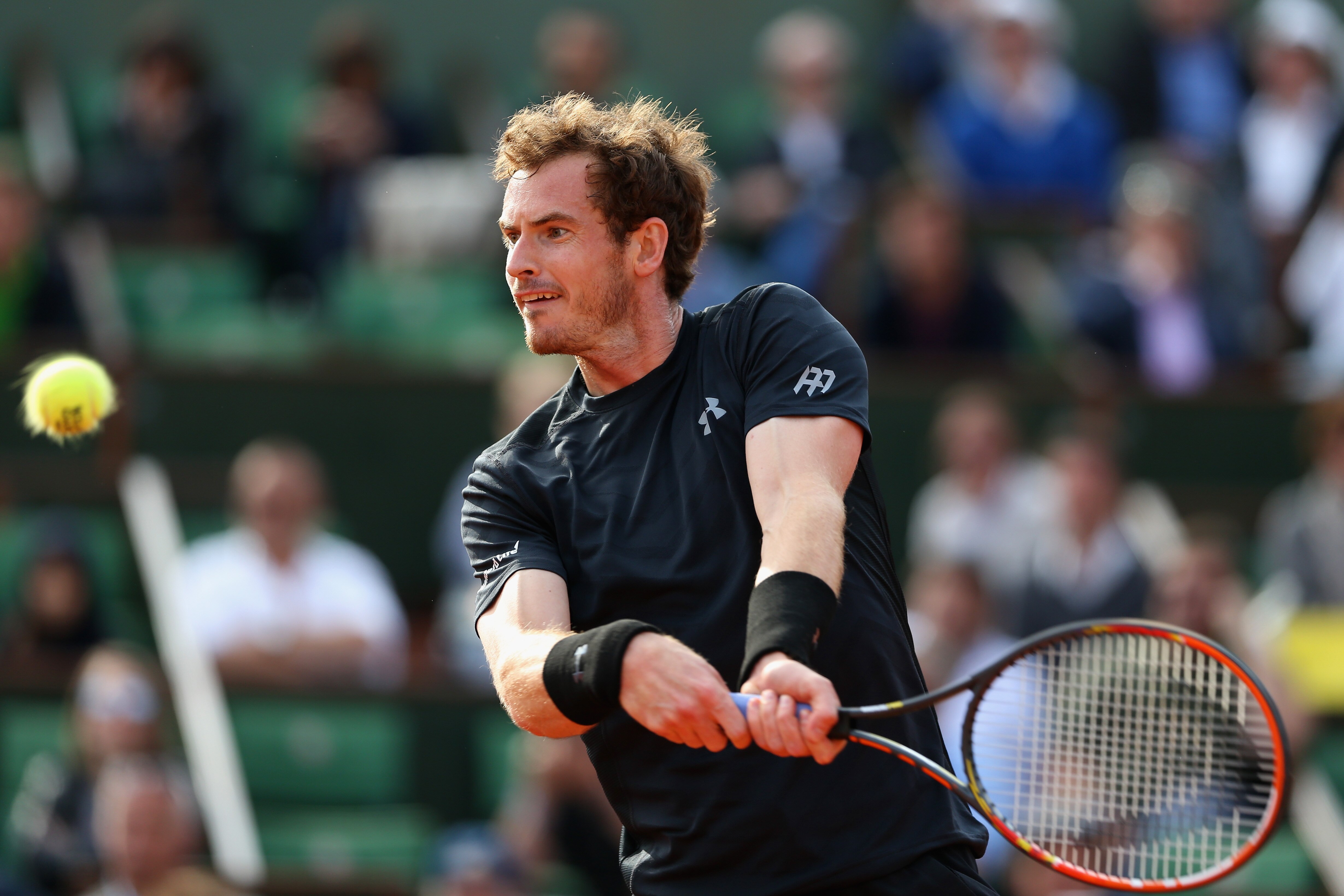 PARIS, FRANCE - MAY 25: Andy Murray of Great Britain plays a backhand in his Men's Singles match against Facundo Arguello of Argentina on day two of the 2015 French Open at Roland Garros on May 25, 2015 in Paris, France. (Photo by Clive Mason/Getty Images)