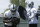 Oakland Raiders fullback Marcel Reece, left, runs through pads during practice at an NFL football facility in Alameda, Calif., Tuesday, June 2, 2015. (AP Photo/Jeff Chiu)