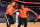 PHOENIX, AZ - JULY 18: Brittney Griner #42 of the Phoenix Mercury and Glory Johnson #25 of the Tulsa Shock run during a WNBA All-Star Cares event on July 18, 2014 at US Airways Center in Phoenix, Arizona. NOTE TO USER: User expressly acknowledges and agrees that, by downloading and/or using this photograph, user is consenting to the terms and conditions of the Getty Images License Agreement.  Mandatory Copyright Notice: Copyright 2014 NBAE (Photo by Barry Gossage/NBAE via Getty Images)