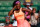 Serena Williams poses with trophy after winning the 2015 French Open.
