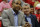 Former NBA player Grant Hill, left,  watches play during the first half in Game 1 of the Eastern Conference finals of the NBA basketball playoffs, between the Atlanta Hawks and the Cleveland Cavaliers, Wednesday, May 20, 2015, in Atlanta. (AP Photo/John Bazemore)