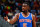 ATLANTA, GA - APRIL 13:  Tim Hardaway Jr. #5 of the New York Knicks reacts after a basket against the Atlanta Hawks at Philips Arena on April 13, 2015 in Atlanta, Georgia.  NOTE TO USER: User expressly acknowledges and agrees that, by downloading and/or using this photograph, user is consenting to the terms and conditions of the Getty Images License Agreement.  (Photo by Kevin C. Cox/Getty Images)