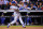 DENVER, CO - JUNE 03:  Justin Turner #10 of the Los Angeles Dodgers takes an at bat against the Colorado Rockies at Coors Field on June 3, 2015 in Denver, Colorado.  (Photo by Doug Pensinger/Getty Images)