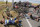 Scores of riders lie on the road after crashing during the third stage of the Tour de France cycling race over 159.5 kilometers (99.1 miles) with start in Antwerp and finish in Huy, Belgium, Monday, July 6, 2015. (AP Photo/Christophe Ena)