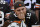 A Cleveland Browns fan watches after Baltimore Ravens kicker Justin Tucker kicks a 32-yard field goal to defeat the Browns 23-21 in an NFL football game Sunday, Sept. 21, 2014, in Cleveland. (AP Photo/David Richard)