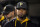 Pittsburgh Pirates starting pitcher Francisco Liriano walks in the dugout during a baseball game against the Washington Nationals in Pittsburgh, Saturday, July 25, 2015. (AP Photo/Gene J. Puskar)