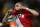 Monaco's Layvin Kurzawa of France reacts  after scoring the third goal during the French League One soccer match against Reims, in Monaco stadium, Friday, Feb. 21 , 2014. (AP Photo/Lionel Cironneau)