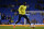 Tottenham Hotspur's Togolese striker Emmanuel Adebayor warms up before the start of the UEFA Europa League group C football match between Tottenham Hotspur and Asteras Tripolis at White Hart Lane in north London, on October 23, 2014. AFP PHOTO / GLYN KIRK        (Photo credit should read GLYN KIRK/AFP/Getty Images)