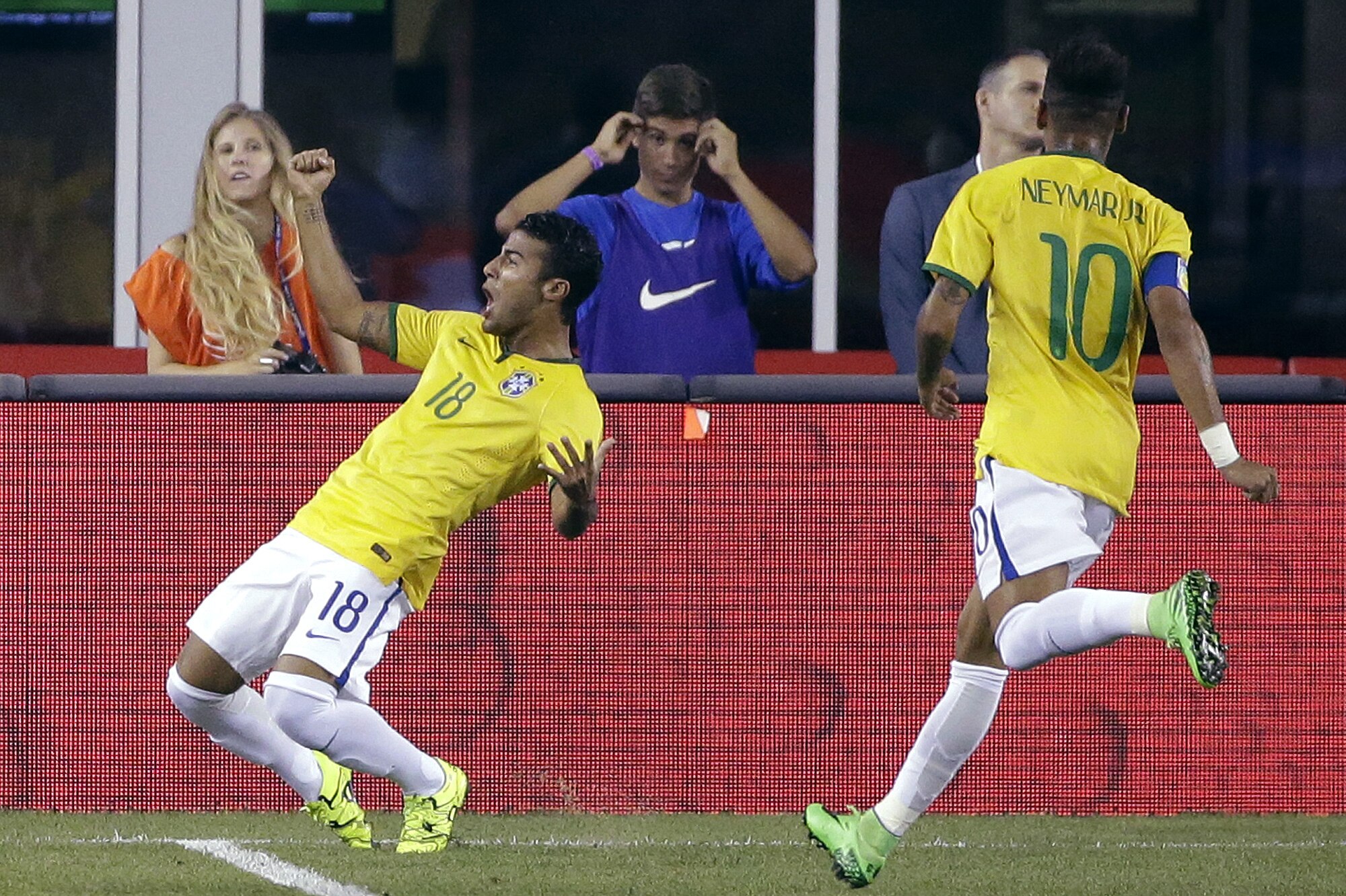 Brazil's Rafinha, left, celebrates his goal as Neymar (10) joins in during the second half of a friendly soccer match against the United States on Tuesday, Sept. 8, 2015, in Foxborough, Mass. (AP Photo/Stephan Savoia)