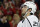 FILE - In this May 18, 2014, file photo, Los Angeles Kings' Slava Voynov reacts  during the second period in Game 1 of the Western Conference finals in the NHL hockey Stanley Cup playoffs in Chicago. Voynov has been charged with felony domestic violence. The Los Angeles County district attorney’s office announced the charge Thursday, Nov. 20, 2014. Voynov faces one felony count of corporal injury to a spouse with great bodily injury. The district attorney’s office says Voynov “caused his wife to suffer injuries to her eyebrow, cheek and neck” during an argument. (AP Photo/Nam Y. Huh, File)