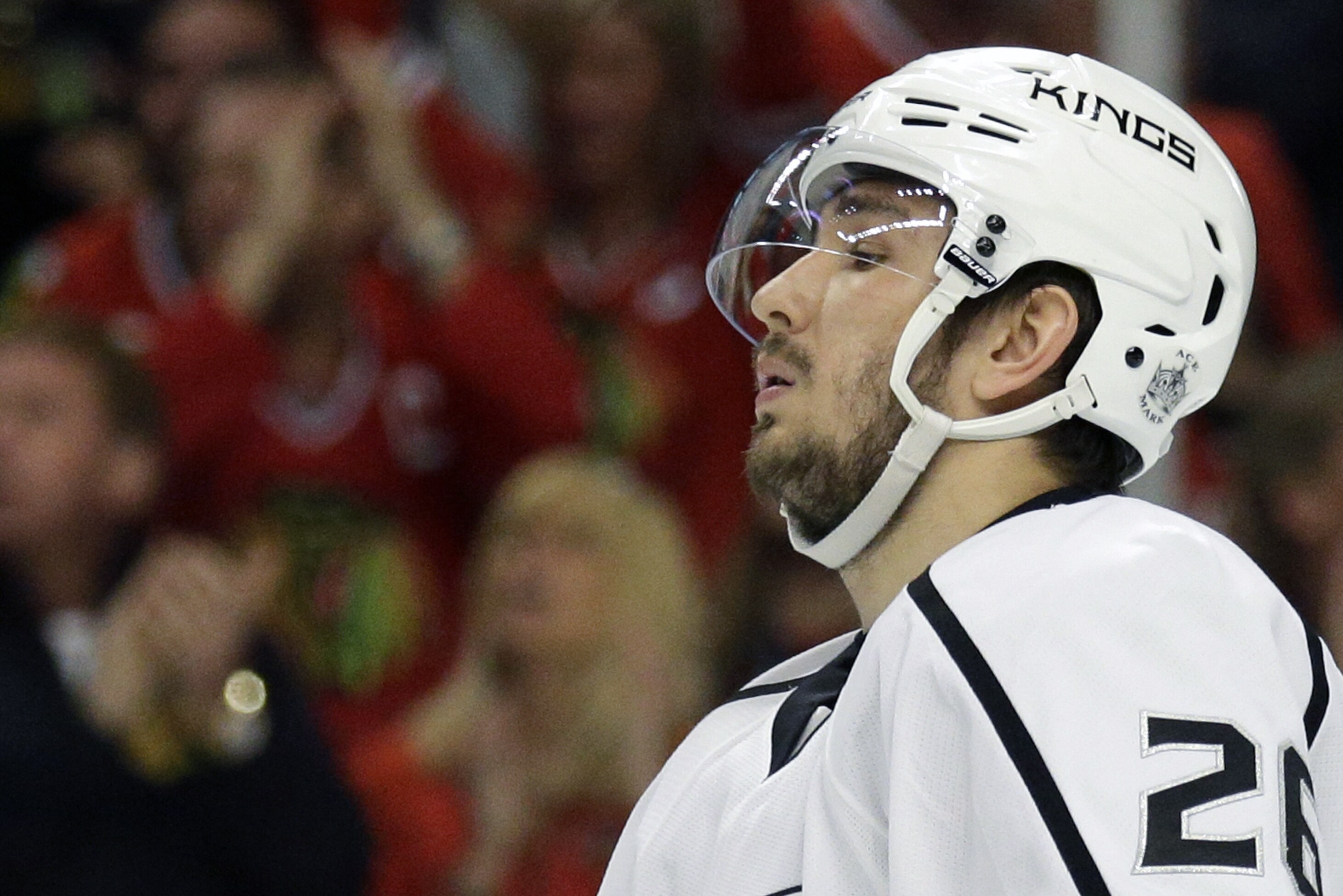 FILE - In this May 18, 2014, file photo, Los Angeles Kings' Slava Voynov reacts during Game 1 of the Western Conference finals in the NHL hockey Stanley Cup playoffs in Chicago. Los Angeles Superior Court Judge Hector M. Guzman ruled Monday Dec. 15, 2014, that there is enough evidence for Voynov to stand trial on a felony domestic violence charge filed after his wife was injured during an argument in October. Voynov has pleaded not guilty and his attorney said in court Monday, Dec. 15, 2014 that his wife has since written a letter to prosecutors describing the incident as an accident. (AP Photo/Nam Y. Huh, File)