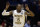 Wichita State's Nick Wiggins celebrates after hitting a shot during the second half of a third-round game against Kentucky of the NCAA college basketball tournament Sunday, March 23, 2014, in St. Louis. (AP Photo/Charlie Riedel)