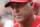 Cincinnati Reds manager Bryan Price walks through the dugout in the sixth inning of a baseball game against the Pittsburgh Pirates, Monday, Sept. 7, 2015, in Cincinnati. (AP Photo/John Minchillo)
