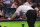 FILE - This April 4, 2010, file photo, shows an official reviewing a replay after a Minnesota Timberwolves drive against Oklahoma City Thunder in the second half of an NBA basketball game in Oklahoma City. The league's expansion of instant replay to include out of bounds calls in the final minutes has played a role in these NBA finals, where the Los Angeles Lakers brought a 2-1 lead over the Boston Celtics into Game 4 on Thursday night, June 10, 2010. (AP Photo/Alonzo Adams, File)