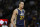 Utah Jazz center Rudy Gobert, of France, heads to the bench while facing the Denver Nuggets in the third quarter of an NBA basketball game Friday, March 27, 2015, in Denver. The Nuggets won 107-91. (AP Photo/David Zalubowski)