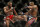 Daniel Cormier, right, kicks Jon Jones during their light heavyweight title mixed martial arts bout at UFC 182, Saturday, Jan. 3, 2015, in Las Vegas. (AP Photo/John Locher)