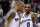 Washington Wizards guard Gilbert Arenas (0) talks to Washington Wizards forward Caron Butler, left, during the first half of an NBA basketball game against the San Antonio Spurs, Saturday, Jan. 2, 2010, in Washington. (AP Photo/Nick Wass)