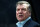 FILE - In this Sunday, May 24, 2015 file photo, Sam Allardyce waits at the start of their English Premier League soccer match between Newcastle United and West Ham United's  at St James' Park, Newcastle, England. Sunderland says it has hired Sam Allardyce as its new manager on a two-year contract. Allardyce replaces Dick Advocaat after the Dutchman quit last weekend following a 2-2 draw at home to West Ham. Sunderland surrendered a two-goal lead in the game and has only three points from eight matches so far in the Premier League, leaving it second from bottom in the standings. Allardyce says “I hope to be able to help to bring the stability and success that everyone wants.” (AP Photo/Scott Heppell, file)