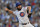 Chicago Cubs starting pitcher Jake Arrieta (49) throws during the first inning of Game 3 in baseball's National League Division Series against the St. Louis Cardinals, Monday, Oct. 12, 2015, in Chicago. (AP Photo/Paul Beaty)