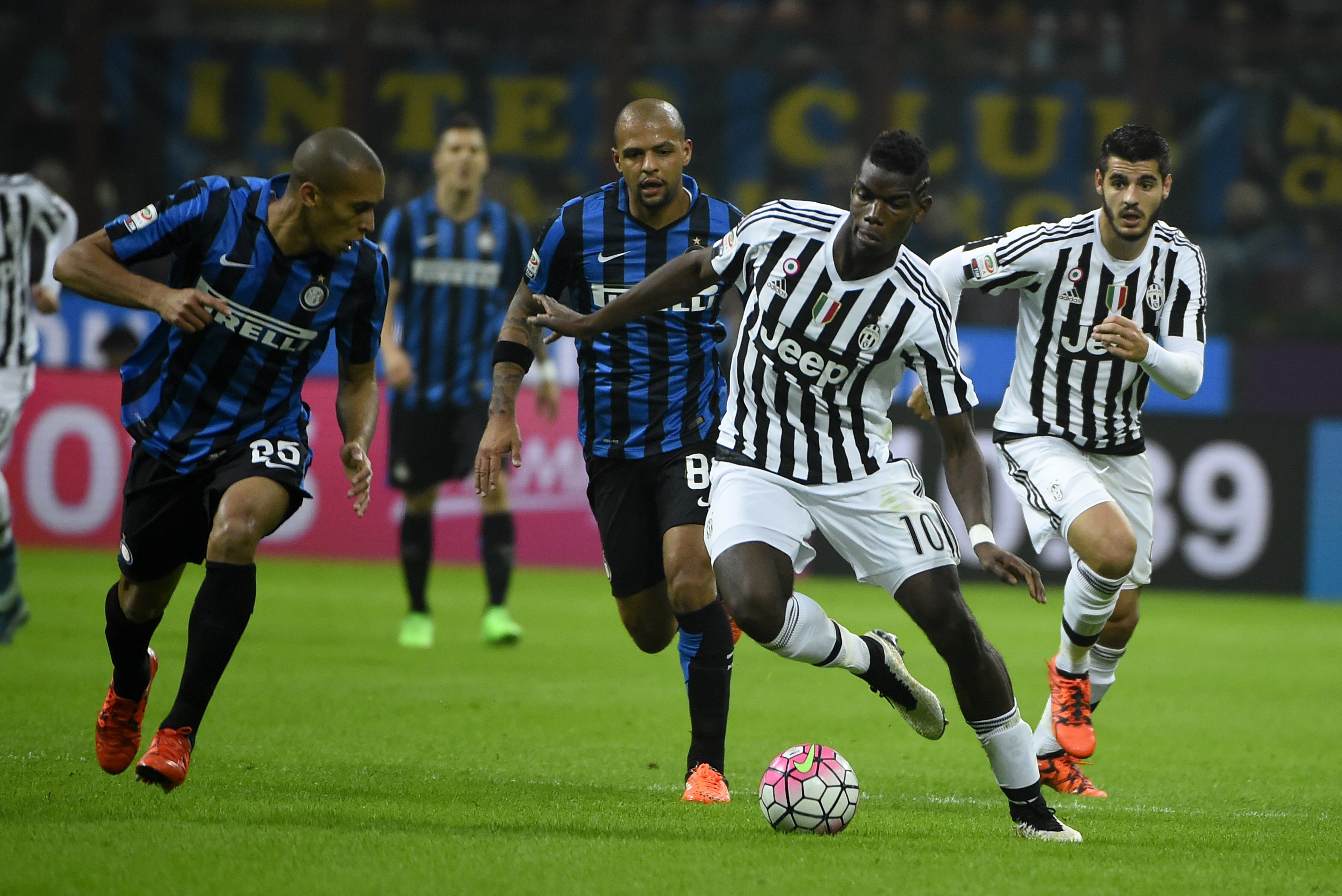 Juventus' midfielder from France Paul Pogba (R) fights for the ball with Inter Milan's defender from Brazil Joao Miranda during the Italian Serie A football match Inter Milan vs Juventus on October18, 2015 at the San Siro Stadium stadium in Milan. AFP PHOTO / OLIVIER MORIN (Photo credit should read OLIVIER MORIN/AFP/Getty Images)