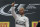 Mercedes driver Lewis Hamilton of Britain thumbs up celebrating his victory at the Formula One Russian Grand Prix at the 'Sochi Autodrom' Formula One circuit in Sochi, Russia, on Sunday, Oct. 11, 2015. (AP Photo/Ivan Sekretarev)