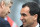 Arsenal's French manager Arsene Wenger (L) speaks to Wigan Athletic's Spanish manager Roberto Martinez before the English Premier league football match at the DW Stadium, Wigan, north-west, England, on April 18, 2010. AFP PHOTO/ANDREW YATES . FOR EDITORIAL USE ONLY Additional licence required for any commercial/promotional use or use on TV or internet (except identical online version of newspaper) of Premier League/Football League photos. Tel DataCo +44 207 2981656. Do not alter/modify photo. (Photo credit should read ANDREW YATES/AFP/Getty Images)