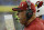 Arizona Cardinals head coach Bruce Arians talks on his headset during the second half of an NFL football game against the Detroit Lions, Sunday, Oct. 11, 2015, in Detroit. (AP Photo/Duane Burleson)