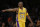 Los Angeles Lakers' Kobe Bryant points to his teammate during the first half of an NBA basketball game against the Minnesota Timberwolves, Wednesday, Oct. 28, 2015, in Los Angeles. (AP Photo/Jae C. Hong)