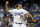 Los Angeles Dodgers starting pitcher Zack Greinke throws to the New York Mets during the first inning in Game 2 of baseball's National League Division Series, Saturday, Oct. 10, 2015 in Los Angeles. (AP Photo/Lenny Ignelzi)