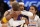 New York Knicks forward Carmelo Anthony (7) embraces Los Angeles Lakers forward Kobe Bryant (24) at the end of an NBA basketball game at Madison Square Garden in New York, Sunday, Nov. 8, 2015. The Knicks defeated the Lakers 99-95. (AP Photo/Kathy Willens)