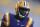 LSU running back Leonard Fournette  warms up in the rain before an NCAA college football game against Western Kentucky in Baton Rouge, La., Saturday, Oct. 24, 2015. (AP Photo/Jonathan Bachman)