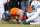 Jan 11, 2015; Denver, CO, USA; Denver Broncos wide receiver Wes Welker (83) lands on the ground after being unable to make a catch against Indianapolis Colts cornerback Darius Butler (20) during the second quarter in the 2014 AFC Divisional playoff football game at Sports Authority Field at Mile High. Mandatory Credit: Chris Humphreys-USA TODAY Sports