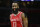 Houston Rockets' James Harden smiles during the second half of an NBA basketball game against the Los Angeles Clippers, Saturday, Nov. 7, 2015, in Los Angeles. The Rockets won 109-105. (AP Photo/Jae C. Hong)