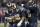 St. Louis Rams defensive tackle Aaron Donald, center, is congratulated by teammates defensive tackle Michael Brockers, right, and defensive end Eugene Sims after sacking Seattle Seahawks quarterback Russell Wilson for a 4-yard loss during the third quarter of an NFL football game Sunday, Sept. 13, 2015, in St. Louis. (AP Photo/Tom Gannam)
