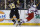 Boston Bruins' Matt Beleskey (39) checks New York Rangers' Derek Stepan (21) during the second period of an NHL hockey game in Boston, Friday, Nov. 27, 2015. (AP Photo/Michael Dwyer)
