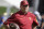 Southern California interim head coach Clay Helton watches his players warm up before an NCAA college football game against UCLA Saturday, Nov. 28, 2015, in Los Angeles. (AP Photo/Jae C. Hong)
