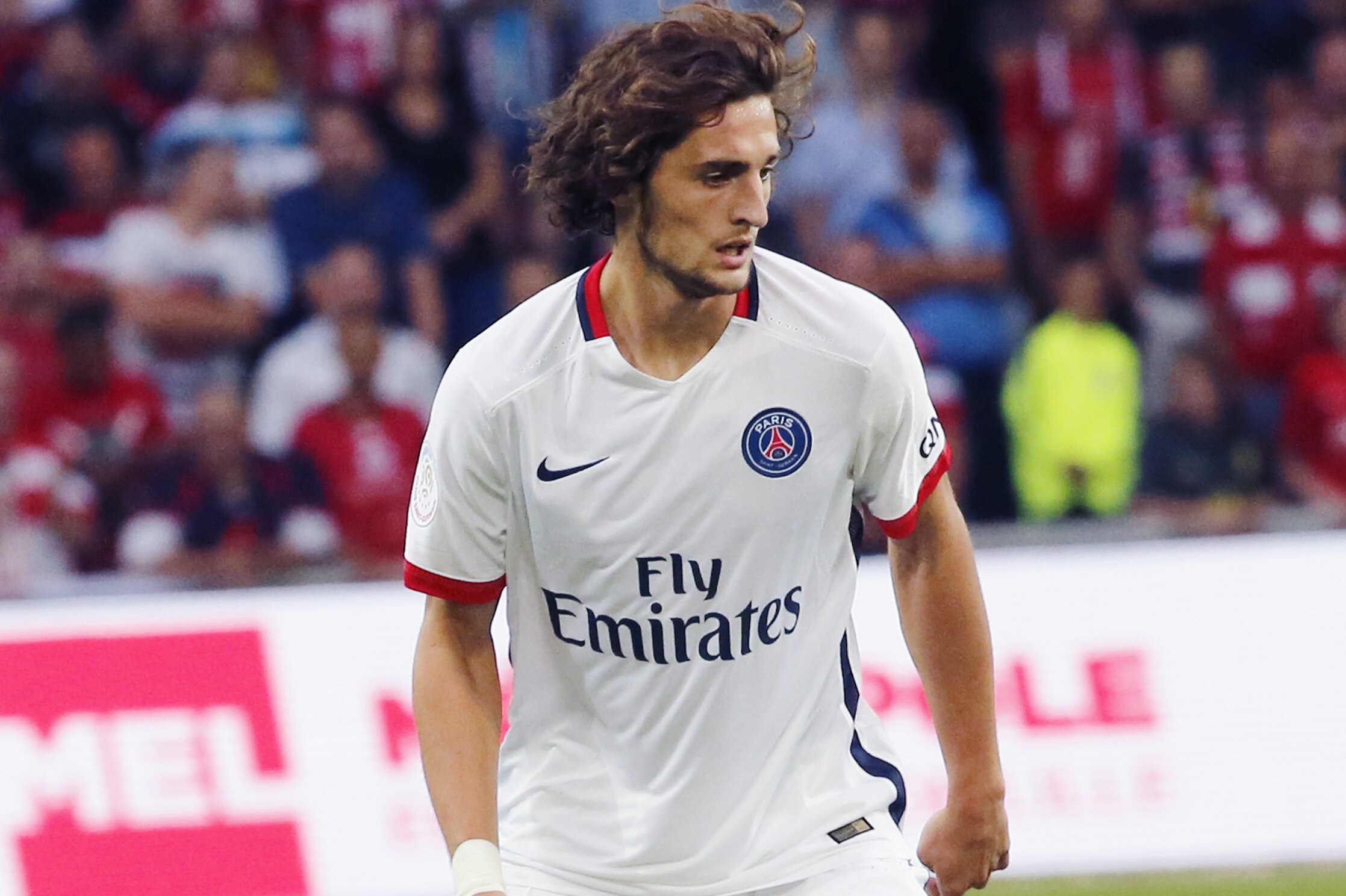Paris Saint Germain's Adrien Rabiot control the ball during his French League one soccer match against Lille at the Lille Metropole stadium, in Villeneuve d'Ascq, northern France, Friday, Aug. 7, 2015.(AP Photo/Jacques Brinon)