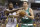 Boston Celtics' David Lee (42) goes to the basket against Indiana Pacers' Myles Turner (33) during the second half of an NBA basketball game Wednesday, Nov. 4, 2015, in Indianapolis. The Pacers won the game 100-98. (AP Photo/Darron Cummings)