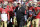 San Francisco 49ers offensive coordinator Geep Chryst, center, before an NFL preseason football game against the Dallas Cowboys in Santa Clara, Calif., Sunday, Aug. 23, 2015. (AP Photo/Ben Margot)