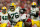 GLENDALE, AZ - DECEMBER 27: Defensive end Mike Daniels #76 of the Green Bay Packers runs with the football after an inceptions in the second quarter of the NFL game against the Arizona Cardinals at the University of Phoenix Stadium on December 27, 2015 in Glendale, Arizona.  (Photo by Christian Petersen/Getty Images)
