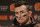 Cleveland Browns quarterback Johnny Manziel speaks with media members following the team's 30-13 loss to the Seattle Seahawks n an NFL football game, Sunday, Dec. 20, 2015, in Seattle.  (AP Photo/Scott Eklund)