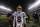 Washington Redskins' Kirk Cousins walks the field after an NFL football game against the Philadelphia Eagles, Saturday, Dec. 26, 2015, in Philadelphia. Washington won 38-24. (AP Photo/Michael Perez)