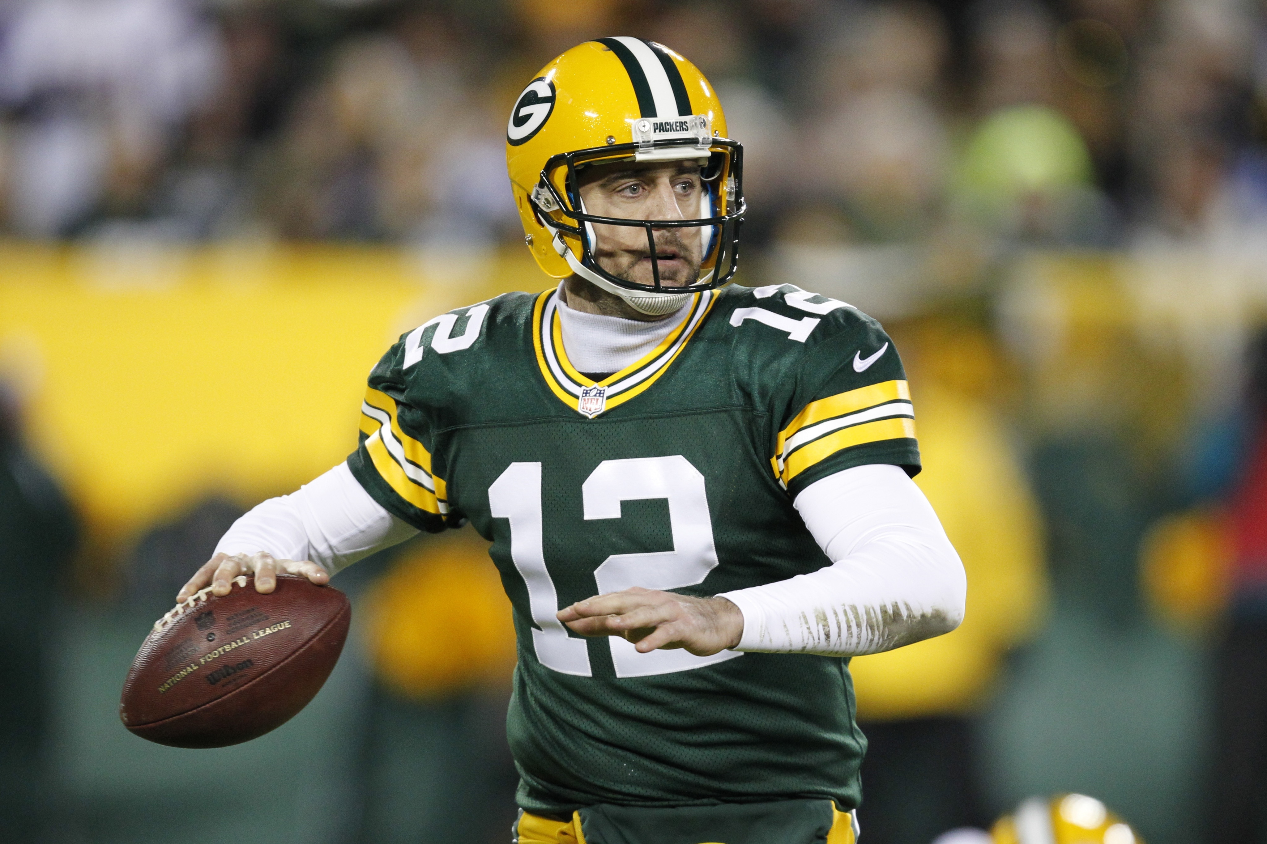 Green Bay Packers' Aaron Rodgers drops back during the first half an NFL football game against the Minnesota Vikings Sunday, Jan. 3, 2016, in Green Bay, Wis. (AP Photo/Matt Ludtke)
