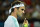 Roger Federer of Switzerland gets ready to serve against Tobias Kamke of Germany during their men's singles match on the fifth day of the Brisbane International tennis tournament on January 7, 2016. AFP PHOTO / Saeed KHAN
-- IMAGE RESTRICTED TO EDITORIAL USE - STRICTLY NO COMMERCIAL USE / AFP / SAEED KHAN        (Photo credit should read SAEED KHAN/AFP/Getty Images)