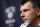 Brooklyn Nets owner Mikhail Prokhorov, of Russia, holds a news conference before an NBA basketball game between the Atlanta Hawks and the Brooklyn Nets Wednesday, April 8, 2015, in New York. (AP Photo/Jason DeCrow)