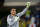 Colombia's goalkeeper Faryd Mondragon, waves to spectators after the group C World Cup soccer match between Japan and Colombia at the Arena Pantanal in Cuiaba, Brazil, Tuesday, June 24, 2014. Colombia won the match 4-1. (AP Photo/Kirsty Wigglesworth)