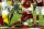 GLENDALE, AZ - JANUARY 16:  Wide receiver Larry Fitzgerald #11 of the Arizona Cardinals scores the game winning touchdown in overtime of the NFC Divisional Playoff Game at University of Phoenix Stadium on January 16, 2016 in Glendale, Arizona. The Arizona Cardinals beat the Green Bay Packers 26-20.  (Photo by Christian Petersen/Getty Images)