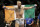 Connor McGregor celebrates after defeating Dustin Poirier in their featherweight mixed martial arts bout at UFC 178 on Saturday, Sept. 27, 2014, in Las Vegas. (AP Photo/John Locher)