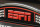 FILE - This Sept. 16, 2013 file photo shows the ESPN logo prior to an NFL football game between the Cincinnati Bengals and the Pittsburgh Steelers, in Cincinnati. ESPN. Disney's ESPN on Wednesday, Oct. 21, 2015 confirmed it is cutting about 300 jobs, or 4 percent of its staff, amid signs that the traditional cable bundle is less far-reaching than it once was. (AP Photo/David Kohl, File)