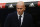 Real Madrid's head coach Zinedine Zidane waits for the start of the game prior the Spanish La Liga soccer match between Real Madrid and Sporting Gijon at the Santiago Bernabeu stadium in Madrid, Sunday, Jan. 17, 2016. Real Madrid won 5-1. (AP Photo/Francisco Seco)